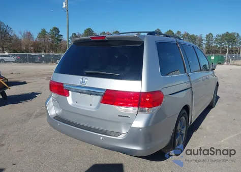2010 Honda Odyssey Touring из США, поврежденный, VIN 5FNRL3H99AB113466